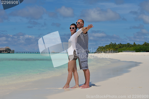 Image of happy young  couple at summer vacation have fun and relax at bea