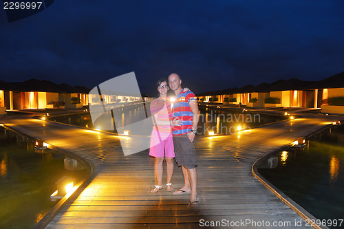Image of happy young  couple at summer vacation have fun and relax at bea
