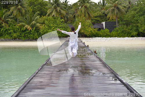 Image of young woman relax on cloudy summer day
