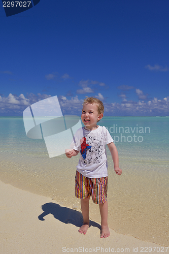 Image of happy young kid on beach