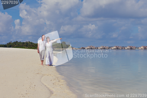 Image of happy young  couple at summer vacation have fun and relax at bea