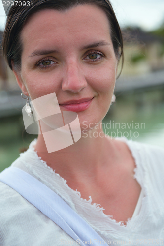 Image of young woman relax on cloudy summer day