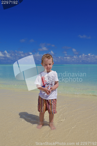 Image of happy young kid on beach