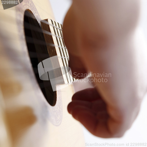 Image of Playing the guitar