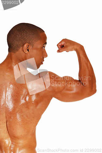 Image of Man showing his biceps.