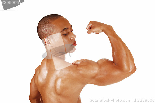 Image of Guy showing his biceps.