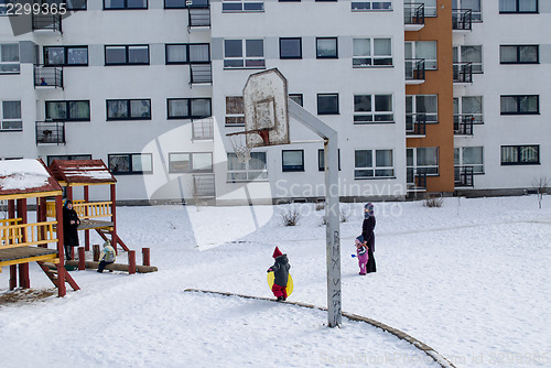 Image of basketball court winter small children nannies 