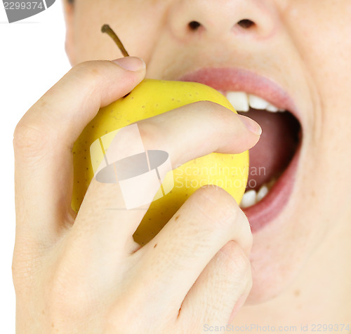 Image of Girl taking a bite of an apple.
