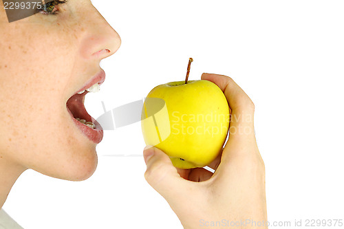 Image of Girl taking a bite of an apple.