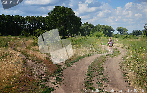 Image of walking woman