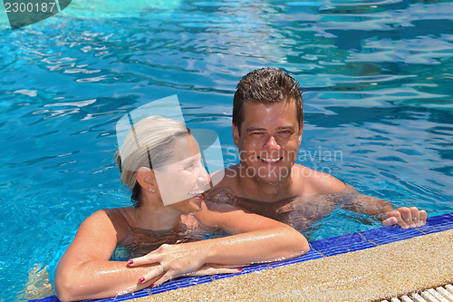 Image of happy young  couple at summer vacation have fun and relax at bea