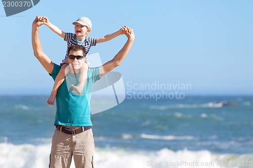 Image of family of two at the beach