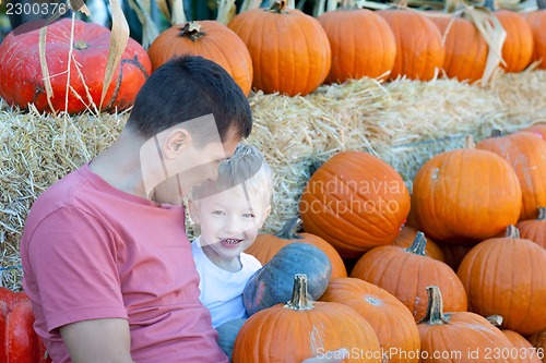 Image of family of two at pumpkin patch