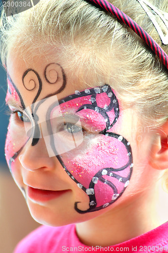 Image of cute little girl with makeup