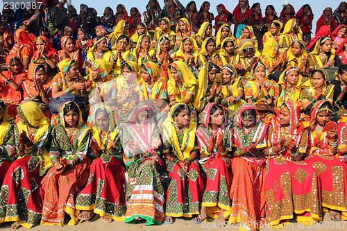 Image of Large group of Indian girls in colorful ethnic attire