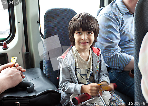 Image of child in a public transport