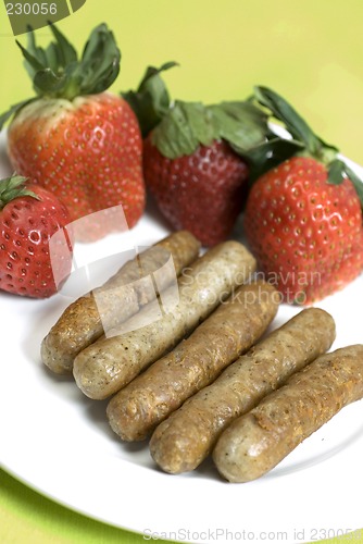 Image of pork sausage links with strawberries