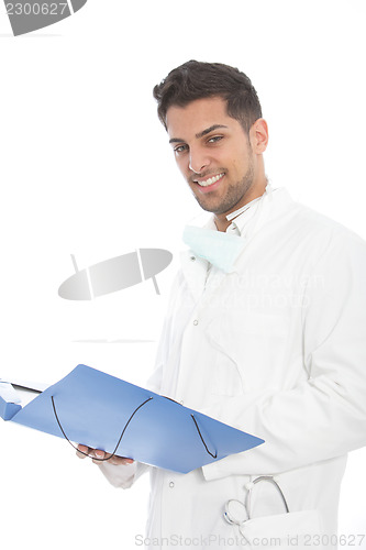 Image of Confident young male doctor with a file