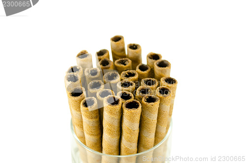 Image of sweet tubules rolls sticks with chocolate cream 