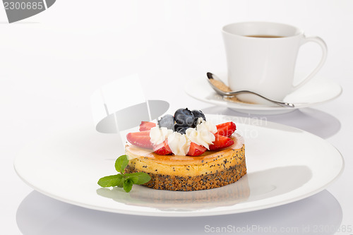Image of Cheesecake and cup of coffee