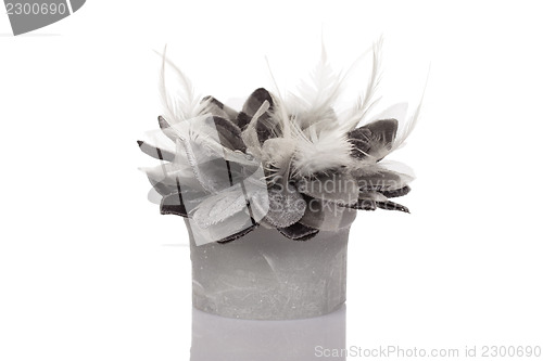 Image of Feathers, beads and candle