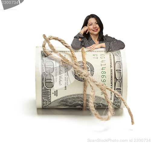 Image of Hispanic Woman Leaning on a Roll Of Hundred Dollar Bills