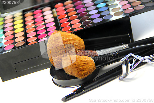 Image of Makeup palette and brushes