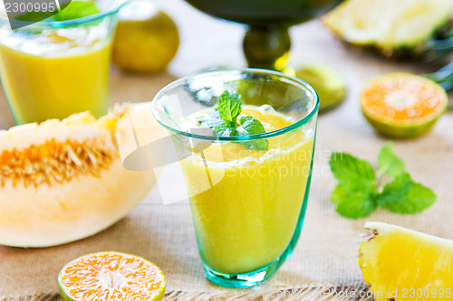 Image of Pineapple with Orange and Melon smoothie