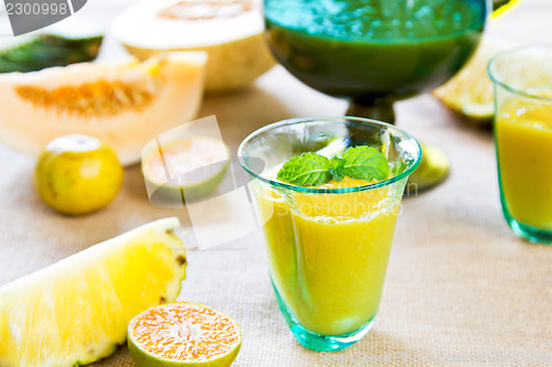 Image of Pineapple with Orange and Melon smoothie