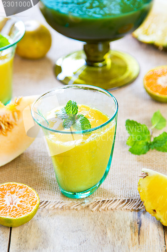 Image of Pineapple with Orange and Melon smoothie