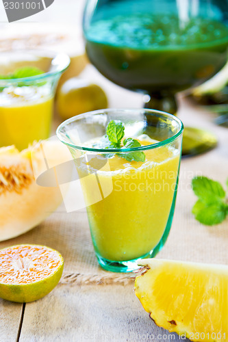 Image of Pineapple with Orange and Melon smoothie