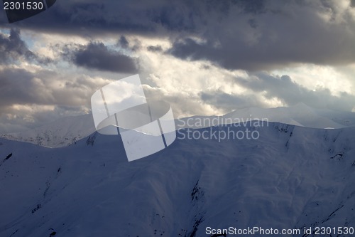 Image of Snow mountain and storm clouds