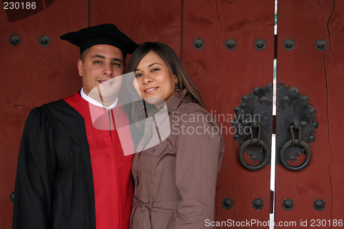 Image of Graduate and his wife on ceremony day.