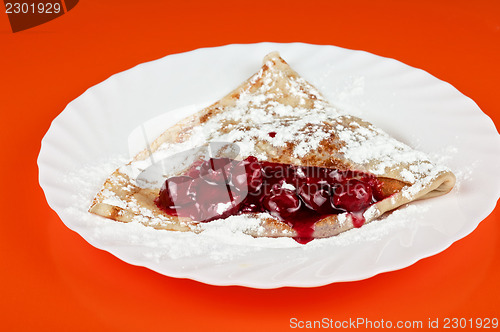 Image of pancakes with cherries