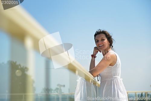 Image of happy woman outdoor