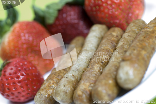 Image of pork sausage links with strawberries