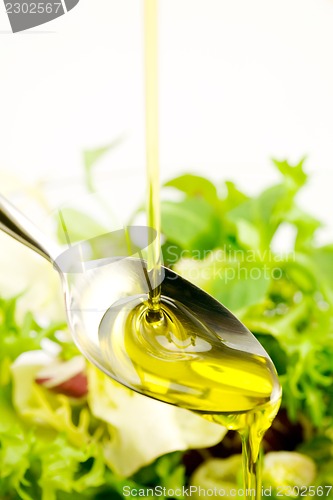 Image of Oil stream on the salad