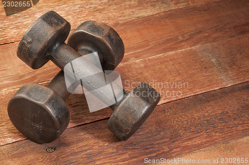 Image of vintage iron dumbbells