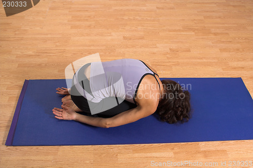 Image of woman doing yoga