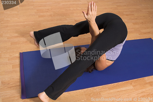 Image of woman doing yoga