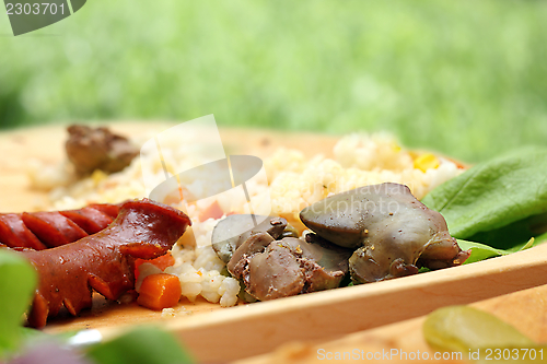 Image of chicken liver and sausages