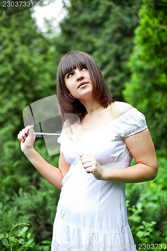 Image of young woman in a forest 