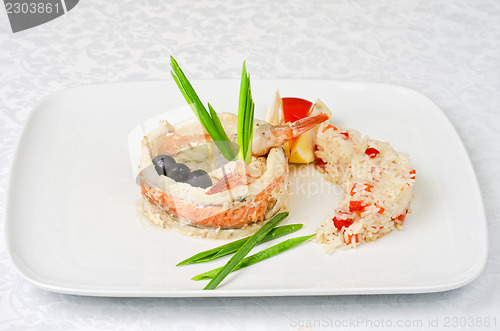 Image of fish with rice and vegetables