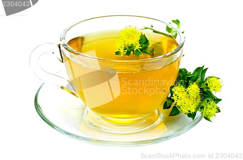 Image of Herbal tea with flowers Rhodiola Rosea on saucer
