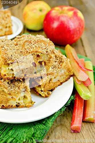 Image of Pie rhubarb and apple on a wooden board