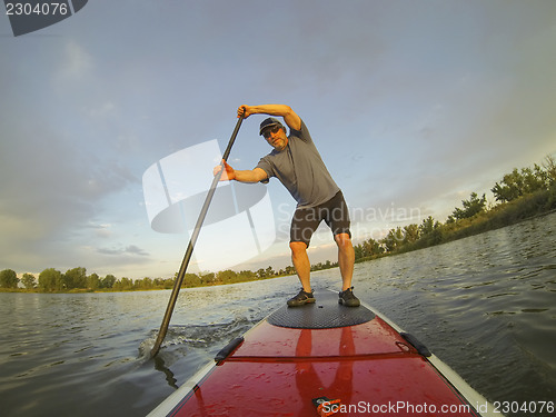 Image of paddling stand up board