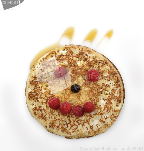 Image of Pancake With Maple Syrup And Berries 