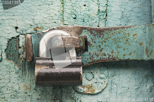 Image of Strong lock on old door