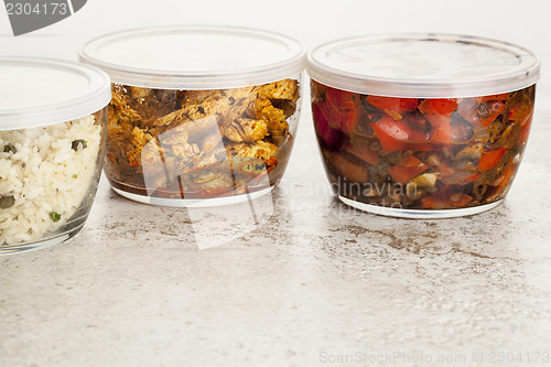 Image of dinner meal in glass containers