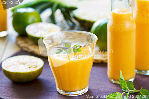 Image of Pineapple with Orange and Mango smoothie